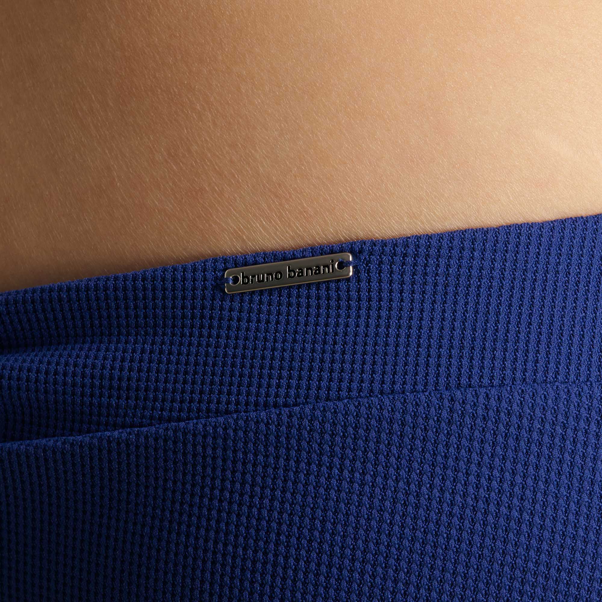 Halsband-Logo, Kragen-Logo, Metallplakette, Kleidung-Detail, Knopf?