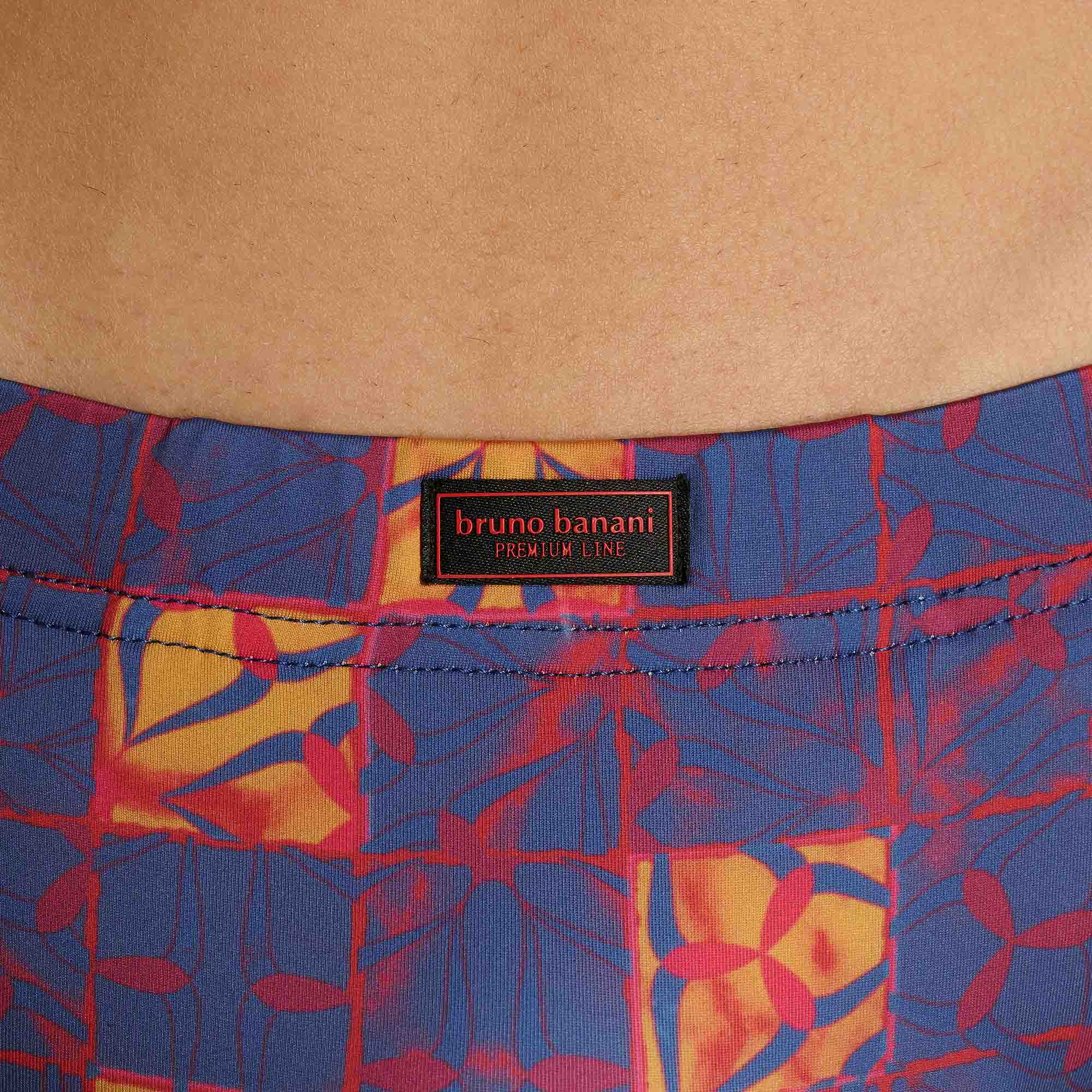 boardshorts, colorful pattern, floral print, elastic waistband, brief label